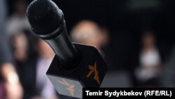 Microphone with the logo of the radio "Azattyk"