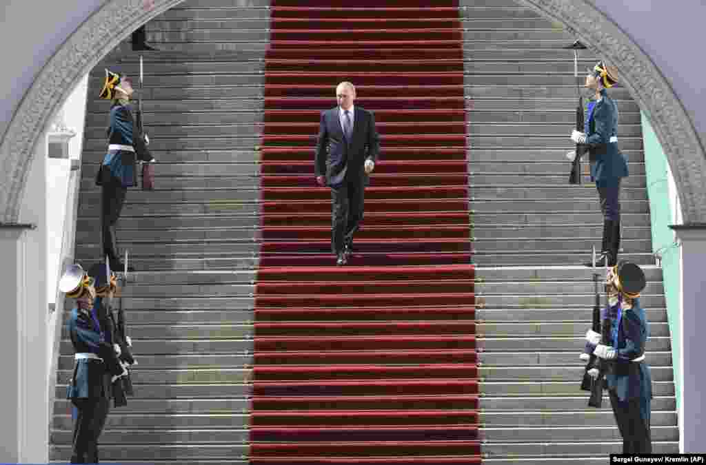 Vladimir Putin after his inauguration ceremony for a new term as Russia&#39;s president in the Kremlin. Putin took the oath of office on May 7 for his fourth term as Russian president and promised to pursue an economic agenda that would boost living standards across the country. (AP/Sergei Guneyev)