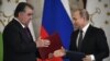 Russian President Vladimir Putin (right) and Tajik counterpart Emomali Rahmon attend a signing ceremony after their talks at the Kremlin in Moscow on April 17.