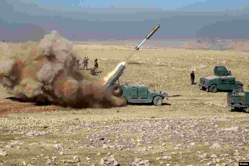 Iraqi forces fire a missile toward Islamic State militants during a battle south of Mosul on February 19. (Reuters/Khalid al Mousily)