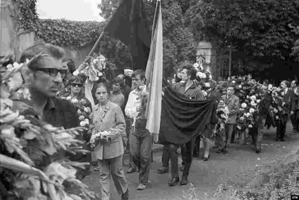 Mourners attend the funeral of 20-year-old Milan Kadlec, who was killed during the invasion.