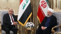 Iraqi Prime Minister Adil Abdul-Mahdi with Iranian President Hassan Rohani in July