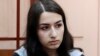 Krestina Khachaturyan, one of three teenage sisters accused of murdering their father, attends a court hearing in Moscow on June 26. 