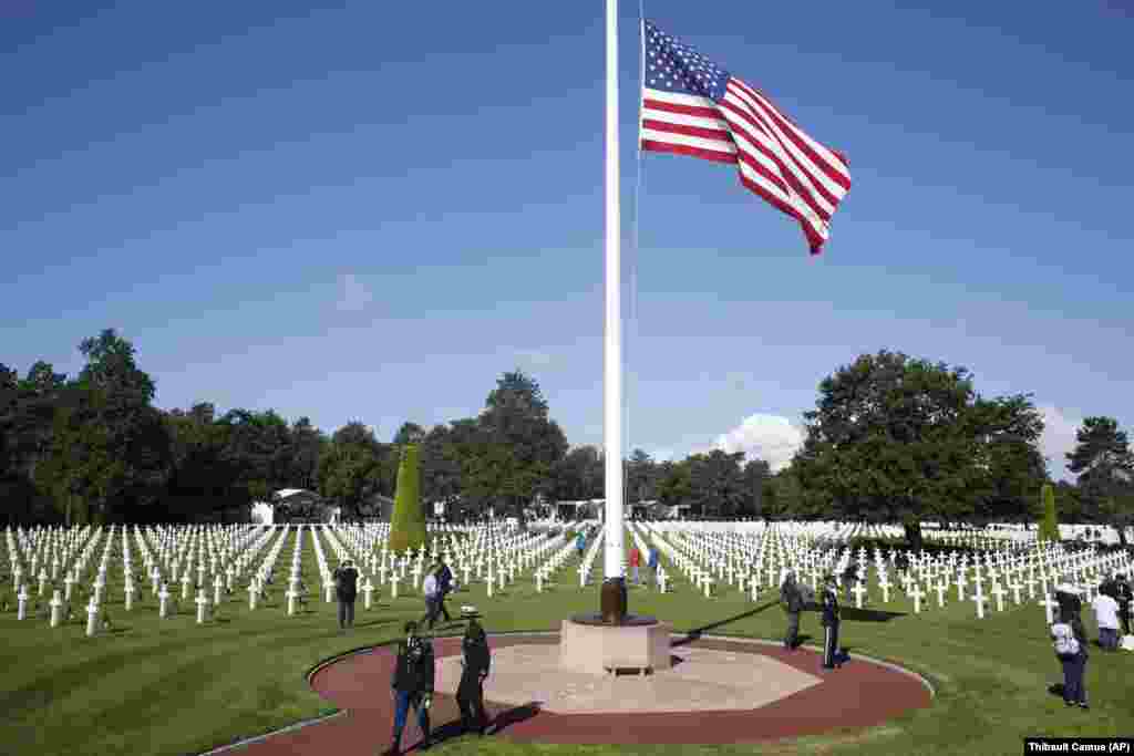 FRANCE -- An American flag flaps in the wind prior to a ceremony to mark the 75th anniversary of D-Day at the Normandy American Cemetery in Colleville-sur-Mer, Normandy, June 6, 2019