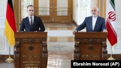 IRAN -- Iranian Foreign Minister Mohammad Javad Zarif, right, and his German counterpart Heiko Maas give a press conference after their talks, in Tehran, June 10, 2019