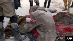 Жертвы авианалета на Алеппо 14 февраля 2014 года