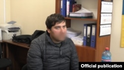 Задержанный Тимур Дзортов, съемка Совета безопасности Украины (архивное фото)