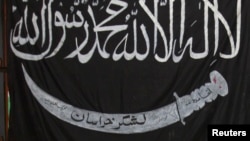 Чорний прапор джигаду, який є прапором угруповання «Ісламська держава»
