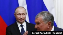 Глава «Роснефти» Игорь Сечин и президент России Владимир Путин