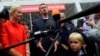 Moscow mayoral candidate Aleksei Navalny (center) speaks to reporters after polls closed on September 8. 