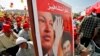 File photo:Hezbollah leader Sheik Hassan Nasrallah and Venezuela's President Hugo Chavez, top, during a Hezbollah "victory over Israel" rally, in Beirut's bombed-out suburbs, Lebanon, Friday, Sept. 22, 2006.