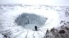 Scientists prepare to descend into the largest of the three craters on the Yamal peninsula.