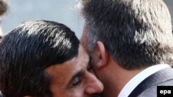 President Mahmud Ahmadinejad (left) greets his Turkish counterpart Abdullah Gul in Tehran.