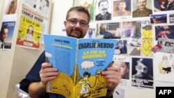 Charlie Hebdo журналының Мұхаммед пайғамбар туралы жариялаған карикатурасы. Париж, 27 желтоқсан 2012 жыл. 