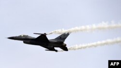 A Pakistani F-16 fighter performs a flypast during the Pakistan Day military parade in Islamabad on March 23.