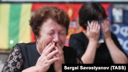 Women attend a ceremony to mark the 13th anniversary of a fatal school hostage-taking attack in southern Russian town of Beslan, on September 1, 2017.