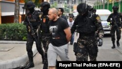 Sergei Medvedev (center) is shown being arrested by Thai special forces in Bangkok on February 9, 2018.