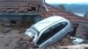 <p>A car is half-buried in mud in the village of Tekija, near the town of Kladovo, in eastern Serbia.</p>
