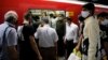 Iranians, mostly wearing face masks, are pictured at a metro station in the capital Tehran on June 10, 2020 amid the coronavirus Covid-19 pandemic crisis. 