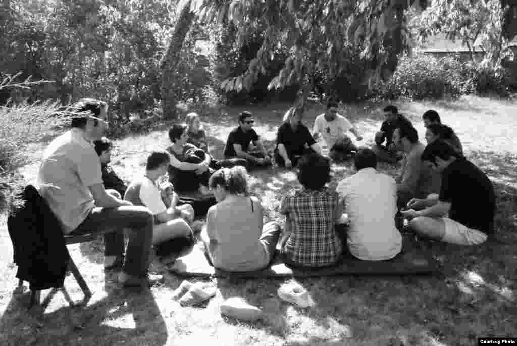 A gathering of some of the members of the Network during one of their occasional group get-aways. Members came together to discuss issues, re-group, and strategize away from the distractions of city life.