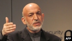 The Afghan opposition has accused President Karzai of proposing an unrealistically early election date knowing that it's not possible.