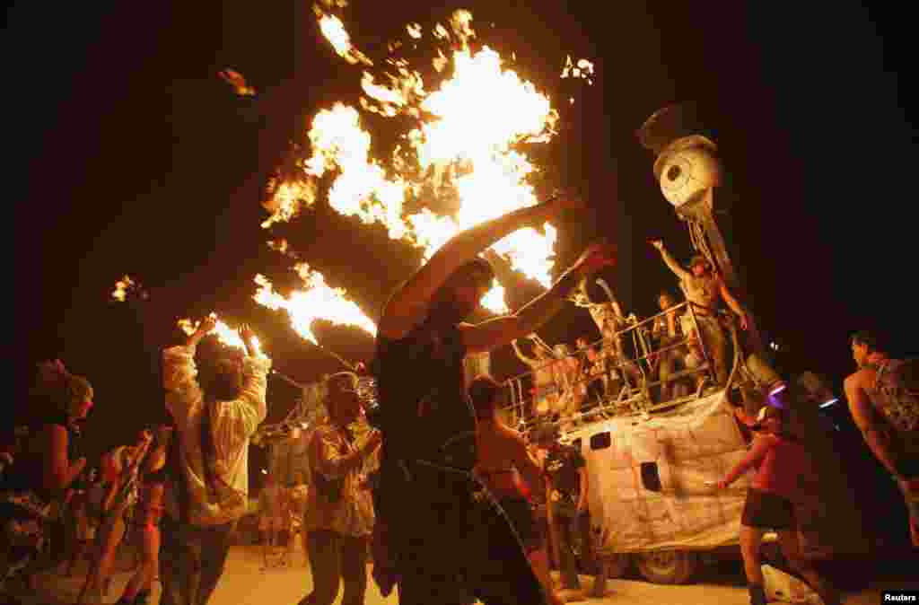 &quot;Shabalaba,&quot; as this man calls himself at the festival, loses himself in dance. 