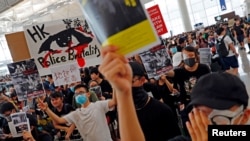 Акция протеста в аэропорту Гонконга, 12 августа 2019 года