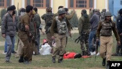 The body of a suspected militant following an attack against Indian paramilitary personnel in Srinagar.