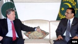 Pakistani President Asif Ali Zardari (right) meets with U.S. envoy Richard Holbrooke in Islamabad.