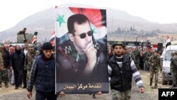 شبه‌نظامیان داوطلبان طرفدار دولت سوریه پس از دوره آموزش نظامی