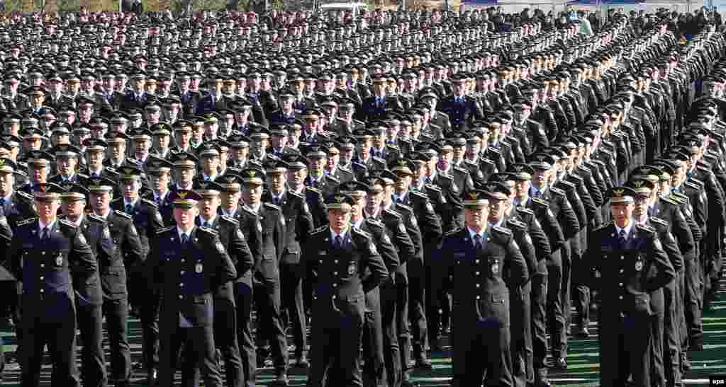 Graduates of the National Central Police Academy attend their graduation ceremony at the school in Chungju, South Korea. (epa/Yonhap)