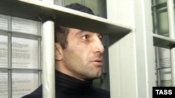 Azerbaijani national Orkhan Zeynalov, seen in detention in Moscow on October 15, is a suspect in the murder one week earlier of Yegor Shcherbakov.