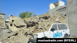 The site of a suicide bomb attack near a building used by the Office of the United Nations High Commissioner for Refugees (UNHCR) in Kandahar on October 31.