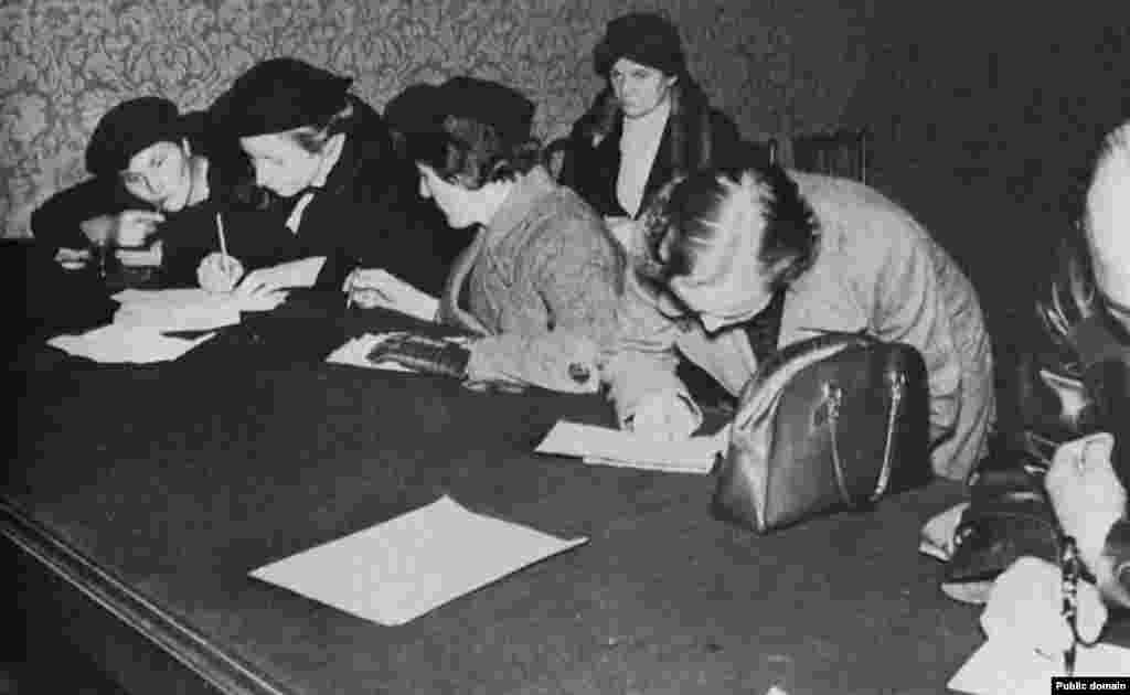 Czechs expelled from the Sudetenland fill out a questionnaire for refugees in Prague on October 13, 1938. The territory annexed by Germany contained over 3 million Germans and 750,000 Czechs.