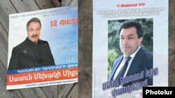 Armenia -- Election campaign posters of Hrazdan Mayor Aram Danielian (R) and his opposition challenger Sasun Mikaelian, 10Feb2012.