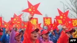 Над 100 000 граждани и 15 000 военни участваха в тържествената манифестация на площад "Тянанмън" в Пекин