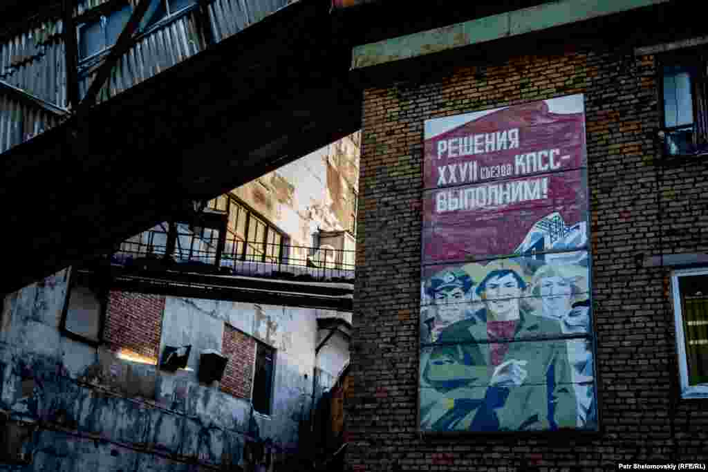 A Soviet-era poster still adorns a wall near the Severnaya coal mine.