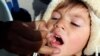 FILE: An Afghan child receives polio vaccine.