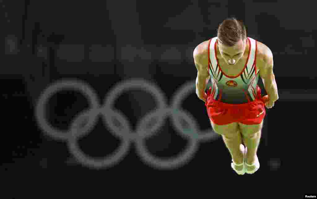 Uladzislau Hancharou of Belarus competes during the men's trampoline qualifications at the Rio Olympic Arena in Barra da Tijuca.