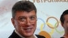 Russian opposition figure Boris Nemtsov at a news conference in Moscow at which he released a report alleging the embezzlement of money allocated to next year's Sochi Winter Olympics