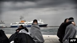 Migranți și refugiați pe Insula Lesbos, 2 martie 2016.