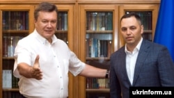 Andriy Portnov (right) joined the administration of Viktor Yanukovych (left) after he defeated Yulia Tymoshenko to win Ukraine's presidency in 2010.