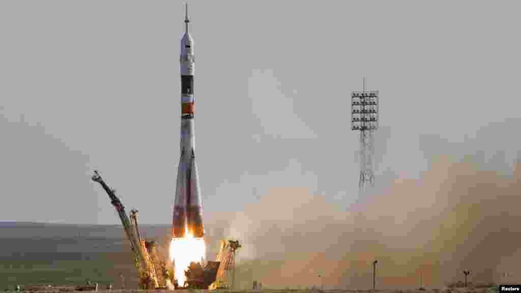 Kazakhstan -- The Soyuz TMA-04M spacecraft carrying the International Space Station (ISS) blasts off from its launch pad at Baikonur cosmodrome, 15May2012