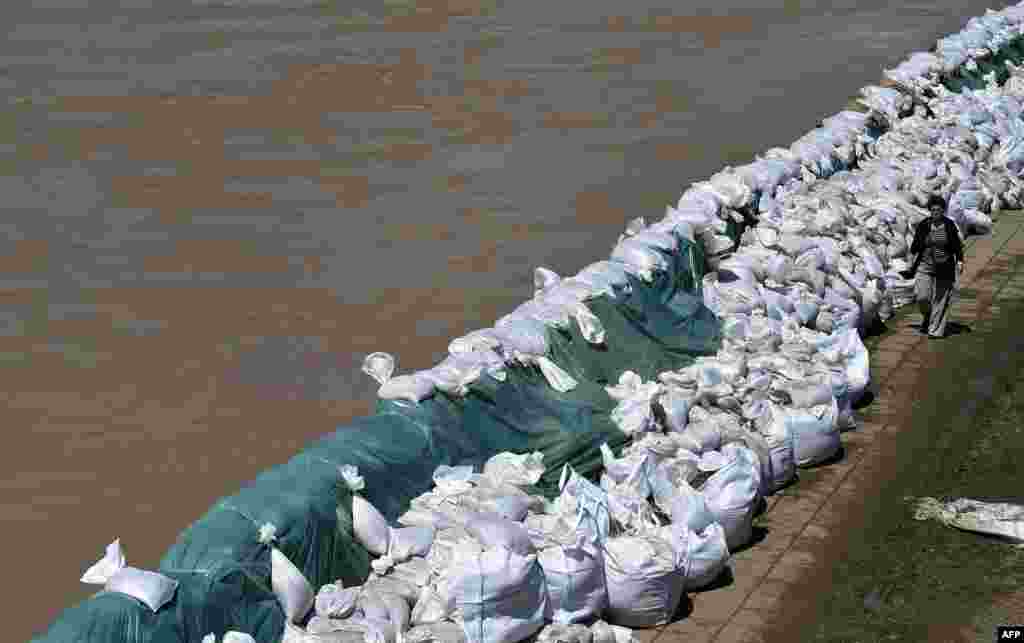Sand bags line the banks of the Sava River in the Serbian city of Sremska Mitrovica.