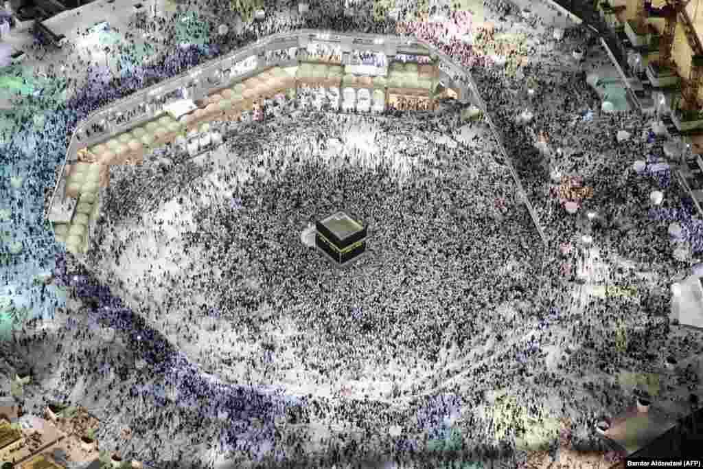 An aerial view shows Muslim pilgrims circumambulating the Kaaba, Islam&#39;s holiest shrine, at the Grand Mosque in Saudi Arabia&#39;s holy city of Mecca during the annual hajj pilgrimage. (AFP/Bandar Aldandani)