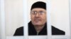 Oyub Titiyev, the head of a regional branch of Russian human rights group Memorial, attends a court hearing on drugs charges in Grozny on March 6. Titiyev says the charges are fabricated in an effort to run the respected rights organization out of Chechnya.