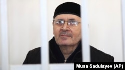 Oyub Titiyev, the head of a regional branch of Russian human rights group Memorial, attends a court hearing on drugs charges in Grozny on March 6. Titiyev says the charges are fabricated in an effort to run the respected rights organization out of Chechnya.