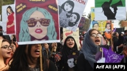 FILE: Pakistani women activists during a rally for women rights on International Women's Day in Lahore on March 8, 2019.