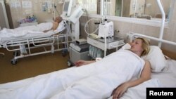 Two of those injured during a bomb blast are seen at the hospital in Dnipropetrovsk on April 28.