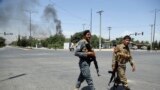 AFGHANISTAN -- Security forces soldiers arrive at the site of an explosion in Kabul, Afghanistan, Monday, July 1, 2019